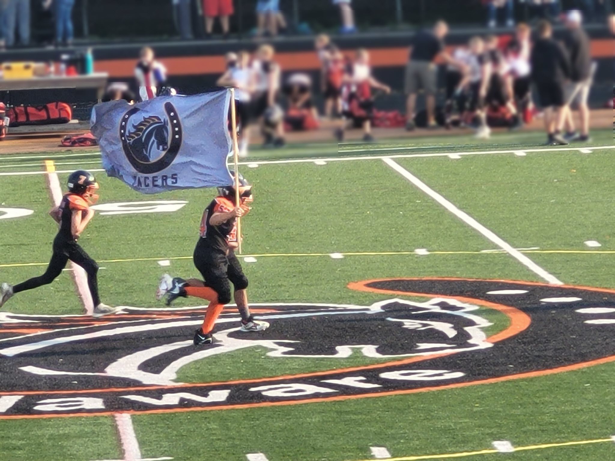 Jr Pacers athletes on the field